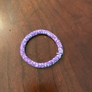Purple and white handmade clay bracelet